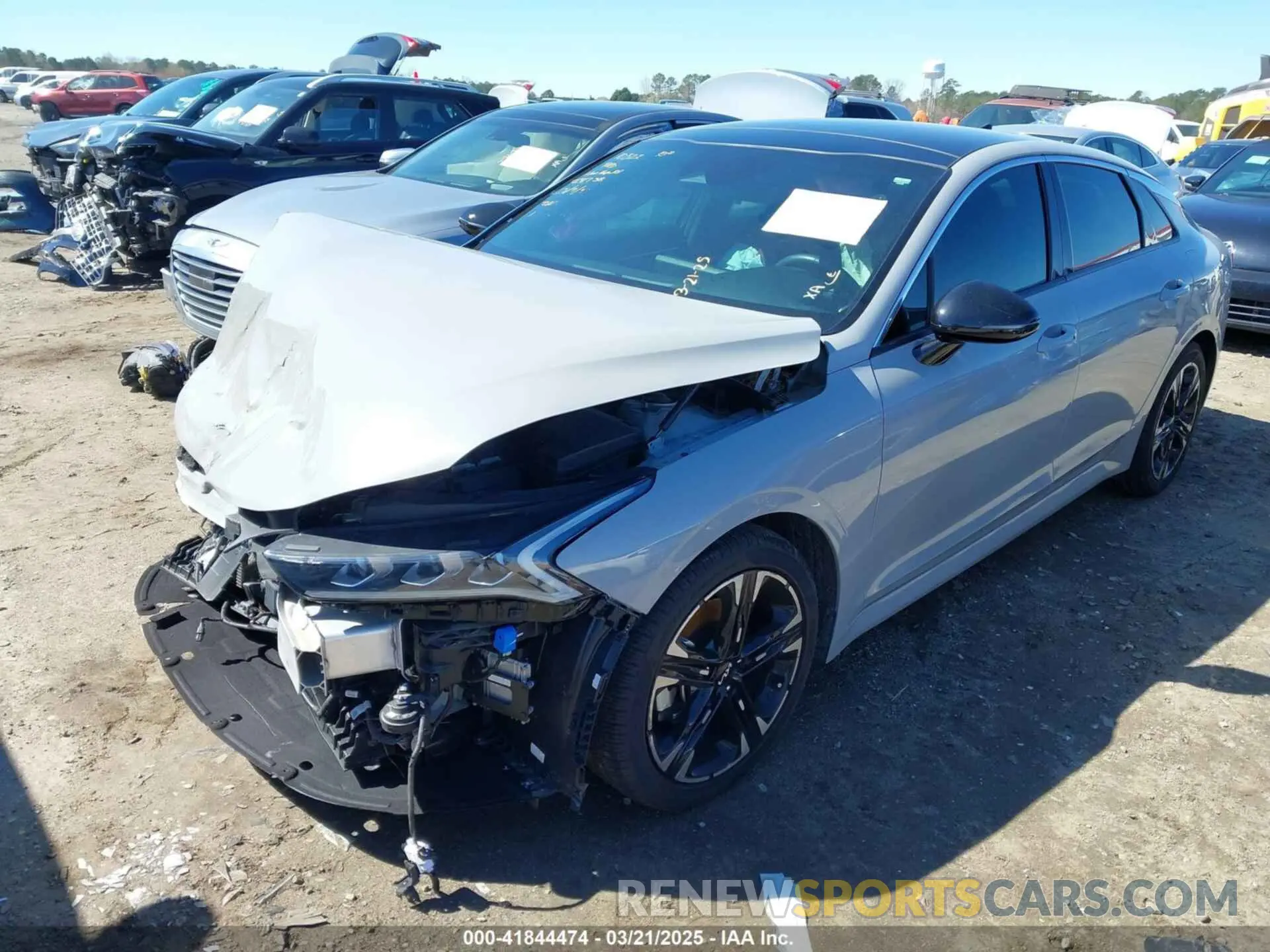 2 fotografías del automóvil dañado 5XXG64J21NG116575 KIA K5 2022