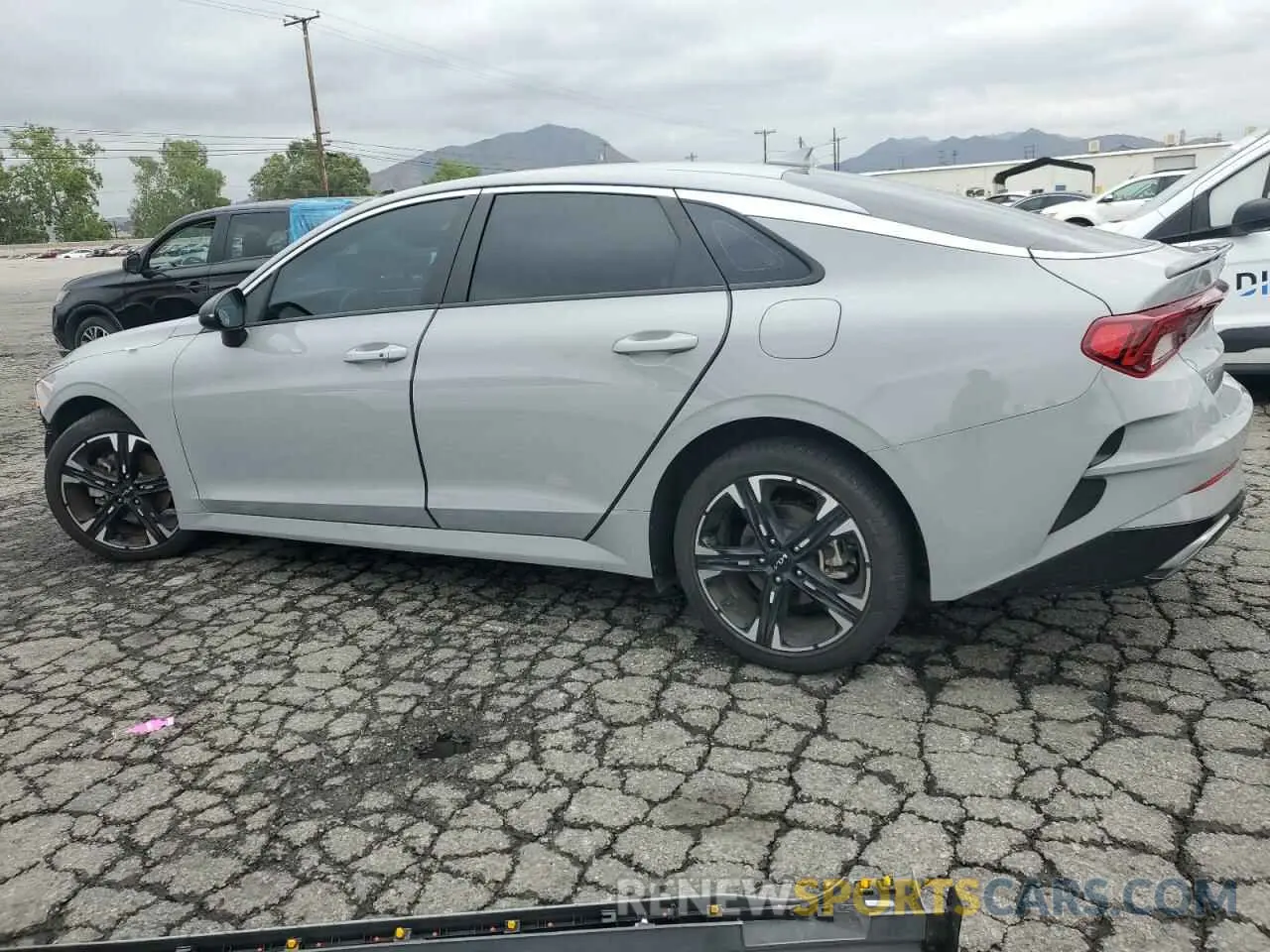 2 fotografías del automóvil dañado 5XXG64J21RG262769 KIA K5 2024