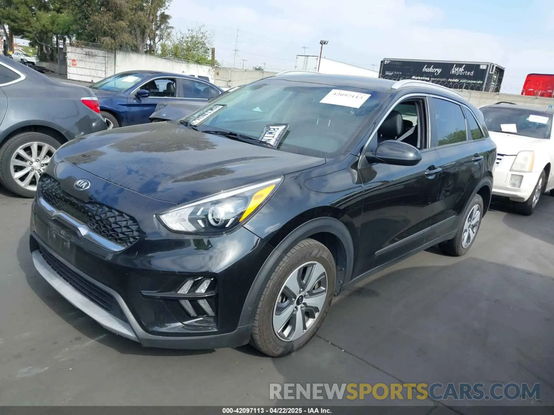 2 fotografías del automóvil dañado KNDCB3LC9M5475783 KIA NIRO 2021