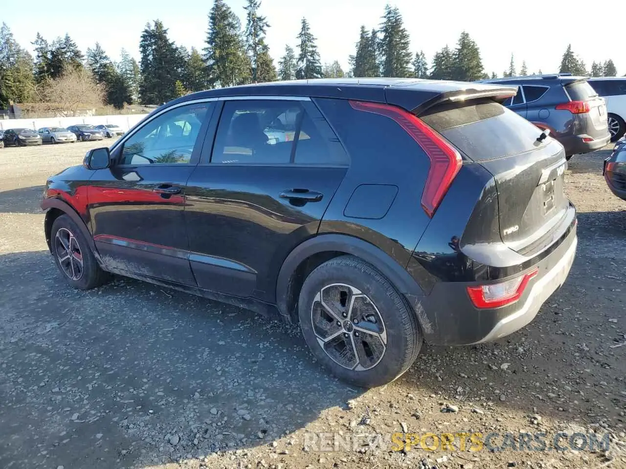 2 fotografías del automóvil dañado KNDCR3LEXP5063972 KIA NIRO 2023