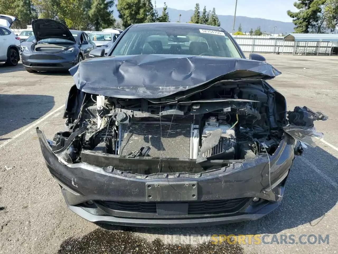 5 fotografías del automóvil dañado 5XXGU4L16KG307172 KIA OPTIMA 2019