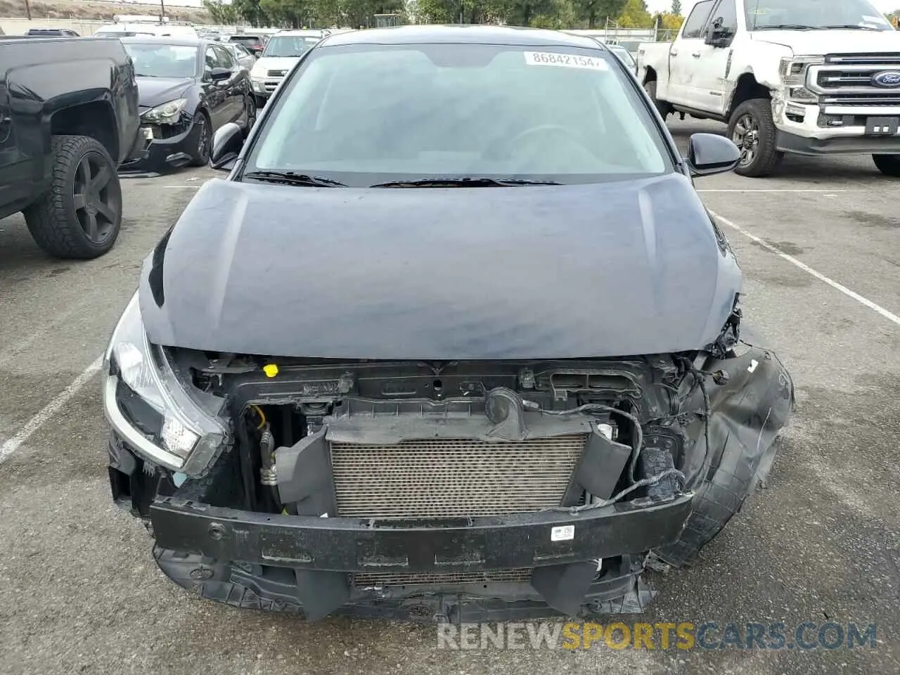 5 fotografías del automóvil dañado 3KPA24AD1ME423187 KIA RIO 2021