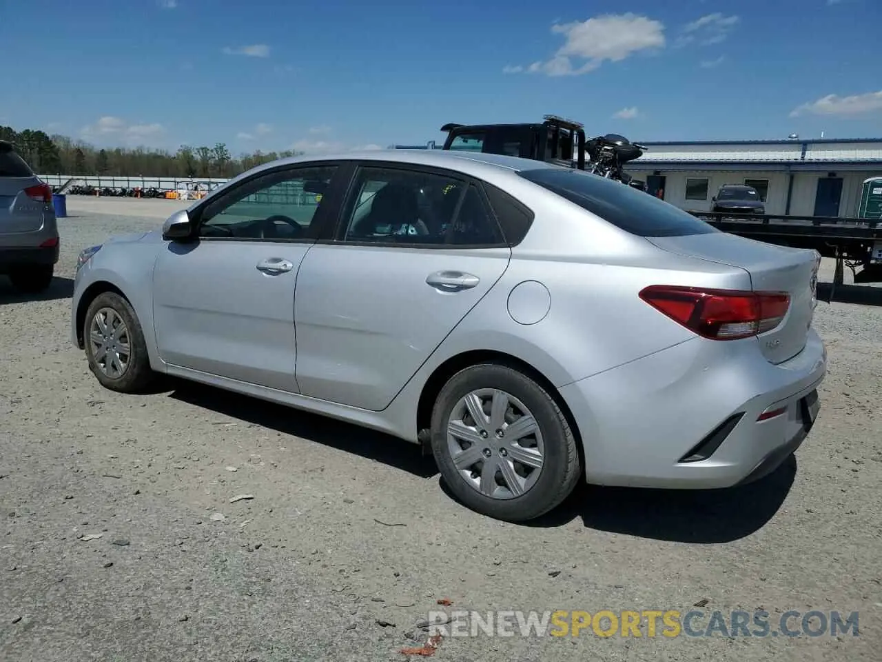 2 fotografías del automóvil dañado 3KPA24AD3ME383145 KIA RIO 2021