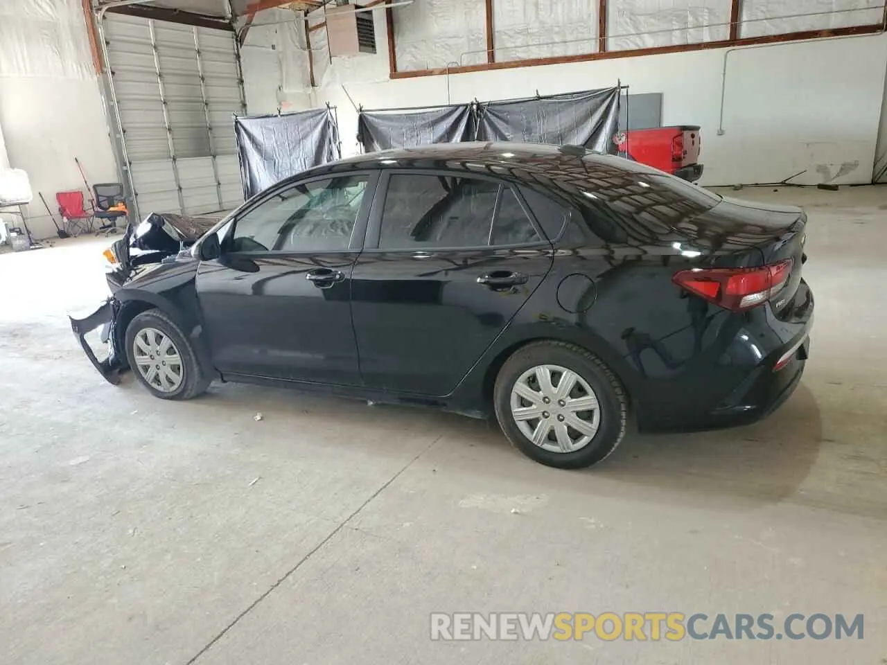 2 fotografías del automóvil dañado 3KPA24AD4ME383252 KIA RIO 2021