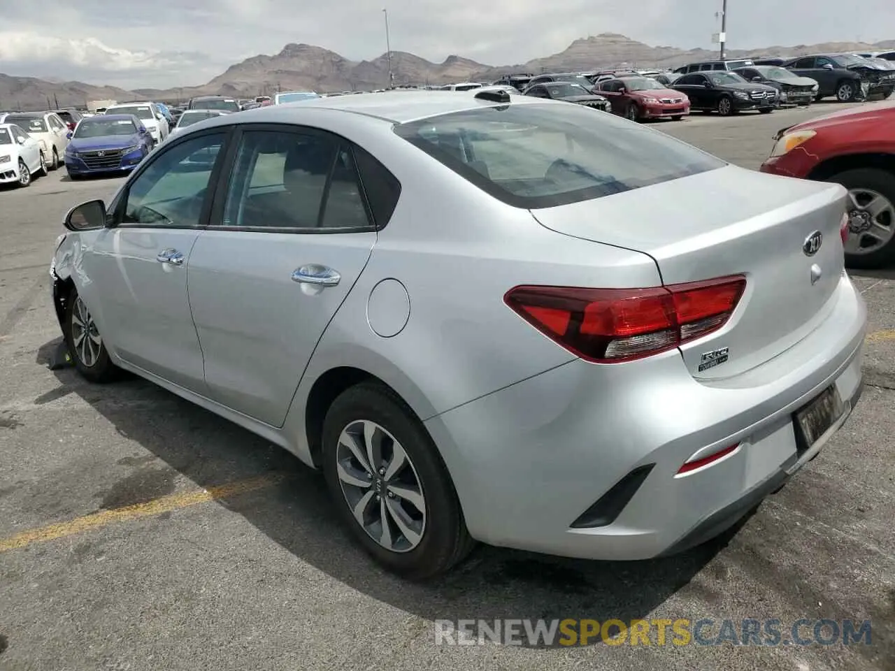 2 fotografías del automóvil dañado 3KPA24AD4ME386295 KIA RIO 2021