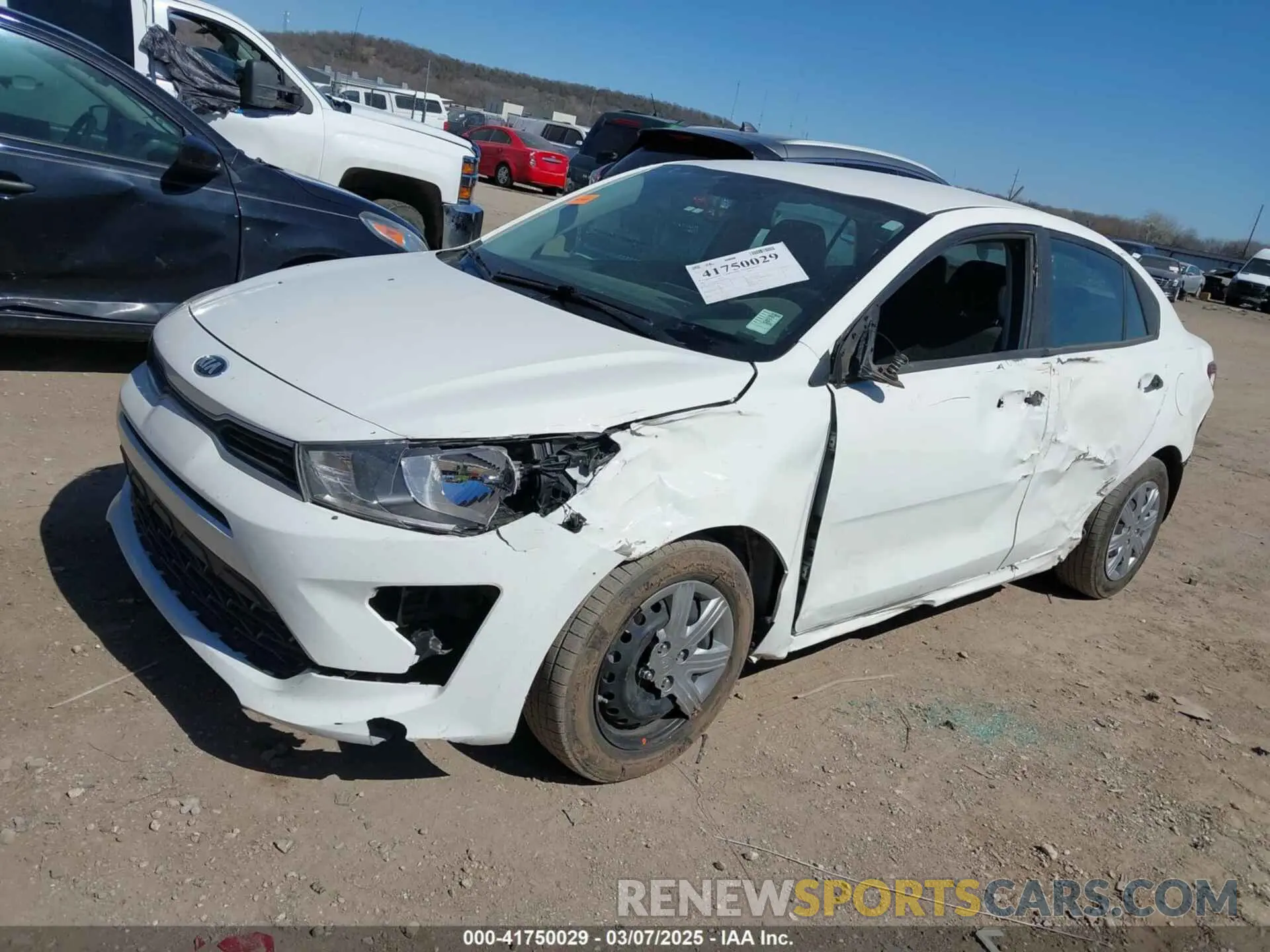 2 fotografías del automóvil dañado 3KPA24AD4ME430442 KIA RIO 2021