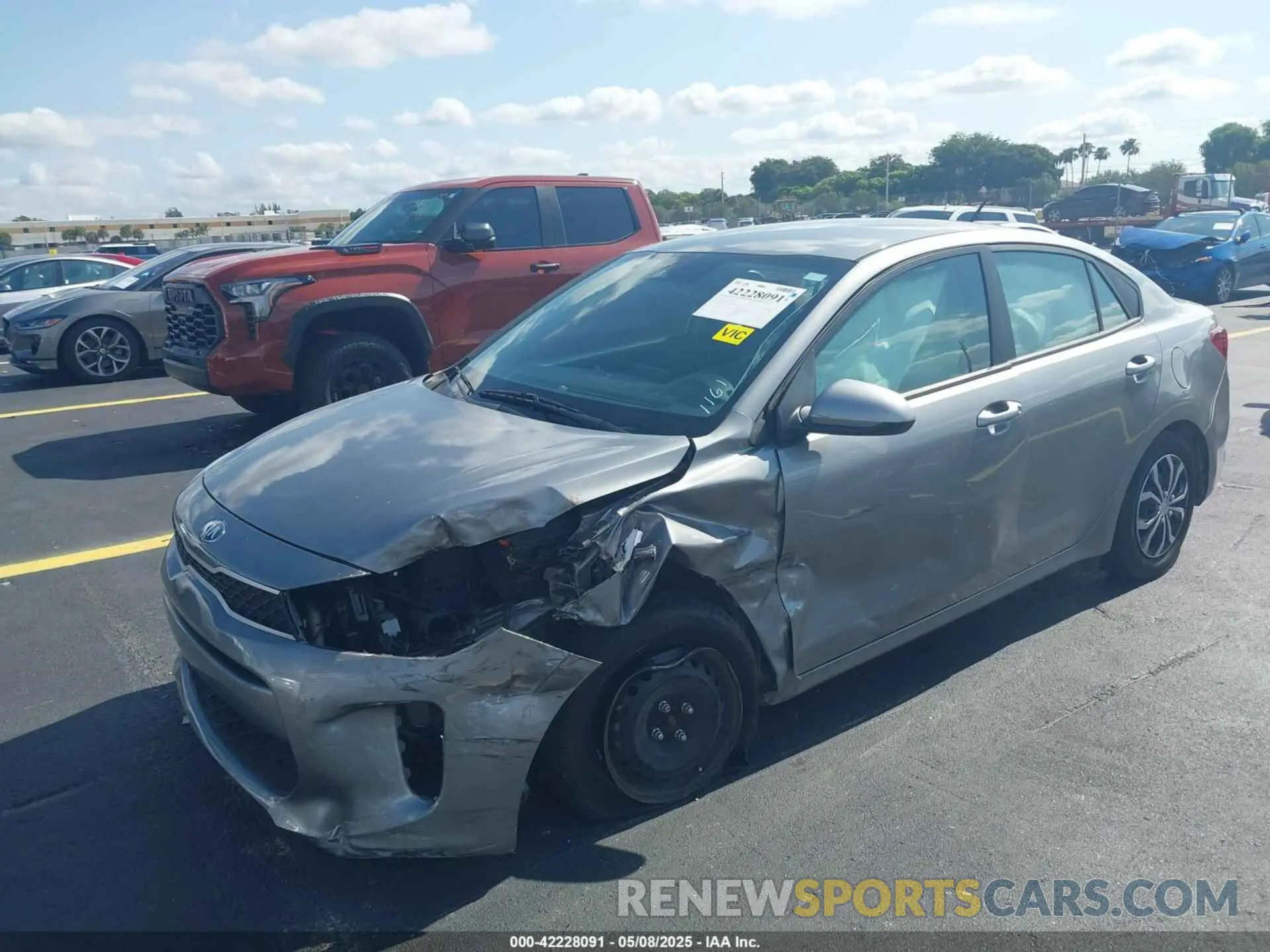 2 fotografías del automóvil dañado 3KPA24AD8ME391161 KIA RIO 2021
