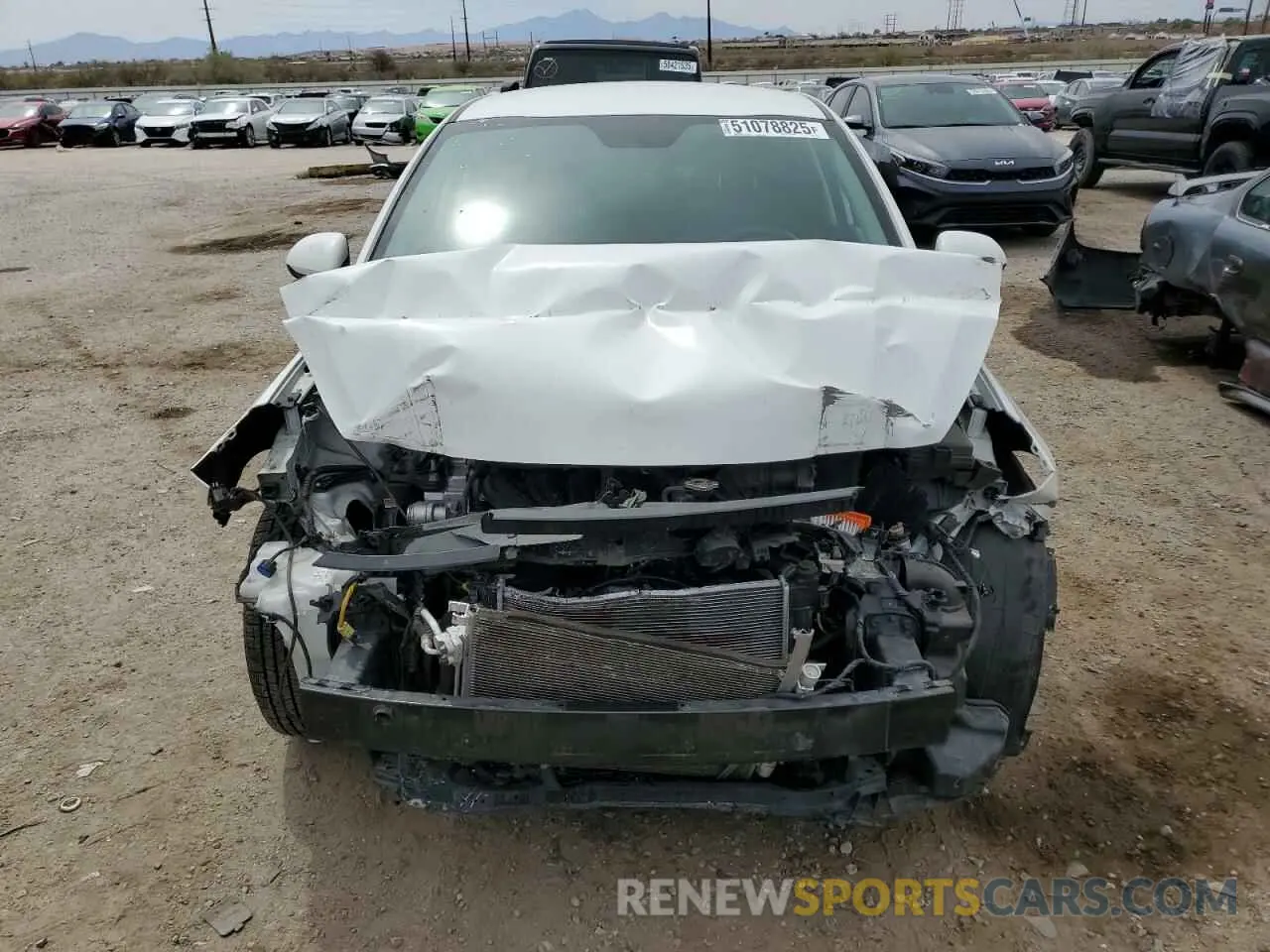 5 fotografías del automóvil dañado 3KPA24AD0NE478831 KIA RIO 2022