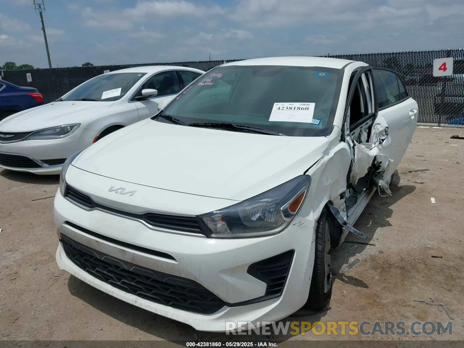 2 fotografías del automóvil dañado 3KPA24AD1NE484816 KIA RIO 2022