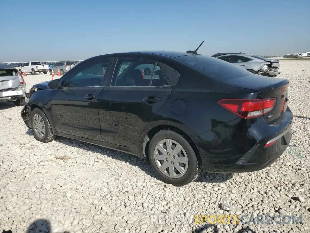 2 fotografías del automóvil dañado 3KPA24AD2NE438931 KIA RIO 2022