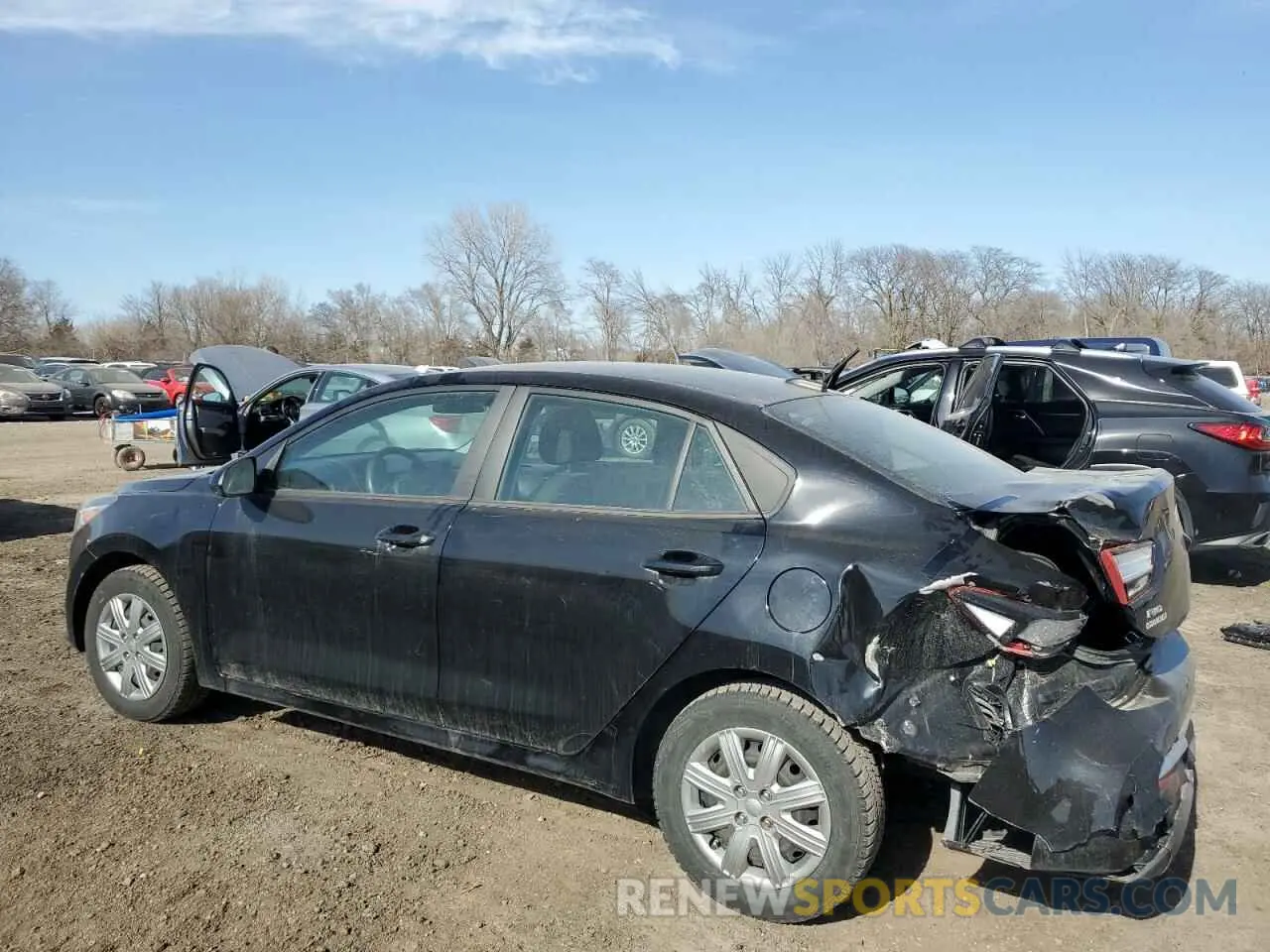 2 fotografías del automóvil dañado 3KPA24AD3NE501857 KIA RIO 2022