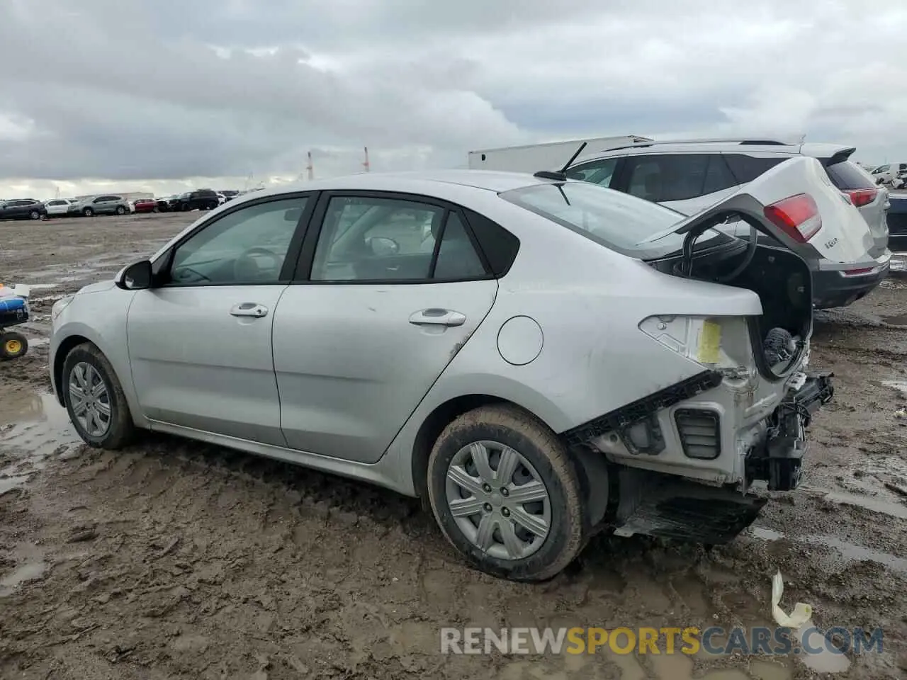 2 fotografías del automóvil dañado 3KPA24AD4NE486009 KIA RIO 2022