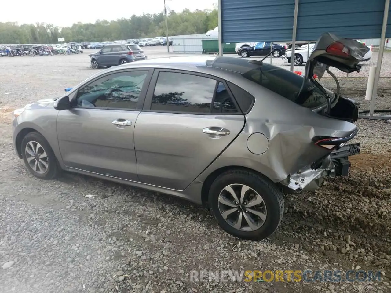 2 fotografías del automóvil dañado 3KPA24AD5NE432542 KIA RIO 2022