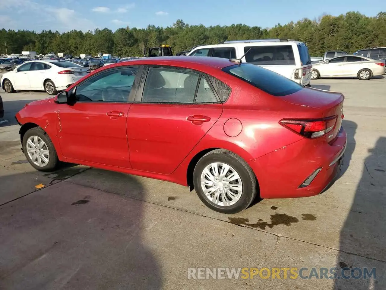 2 fotografías del automóvil dañado 3KPA24AD7NE439511 KIA RIO 2022