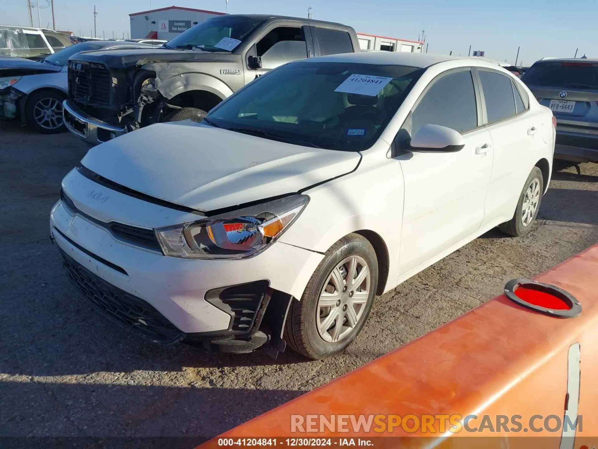 2 fotografías del automóvil dañado 3KPA24AD8NE496381 KIA RIO 2022