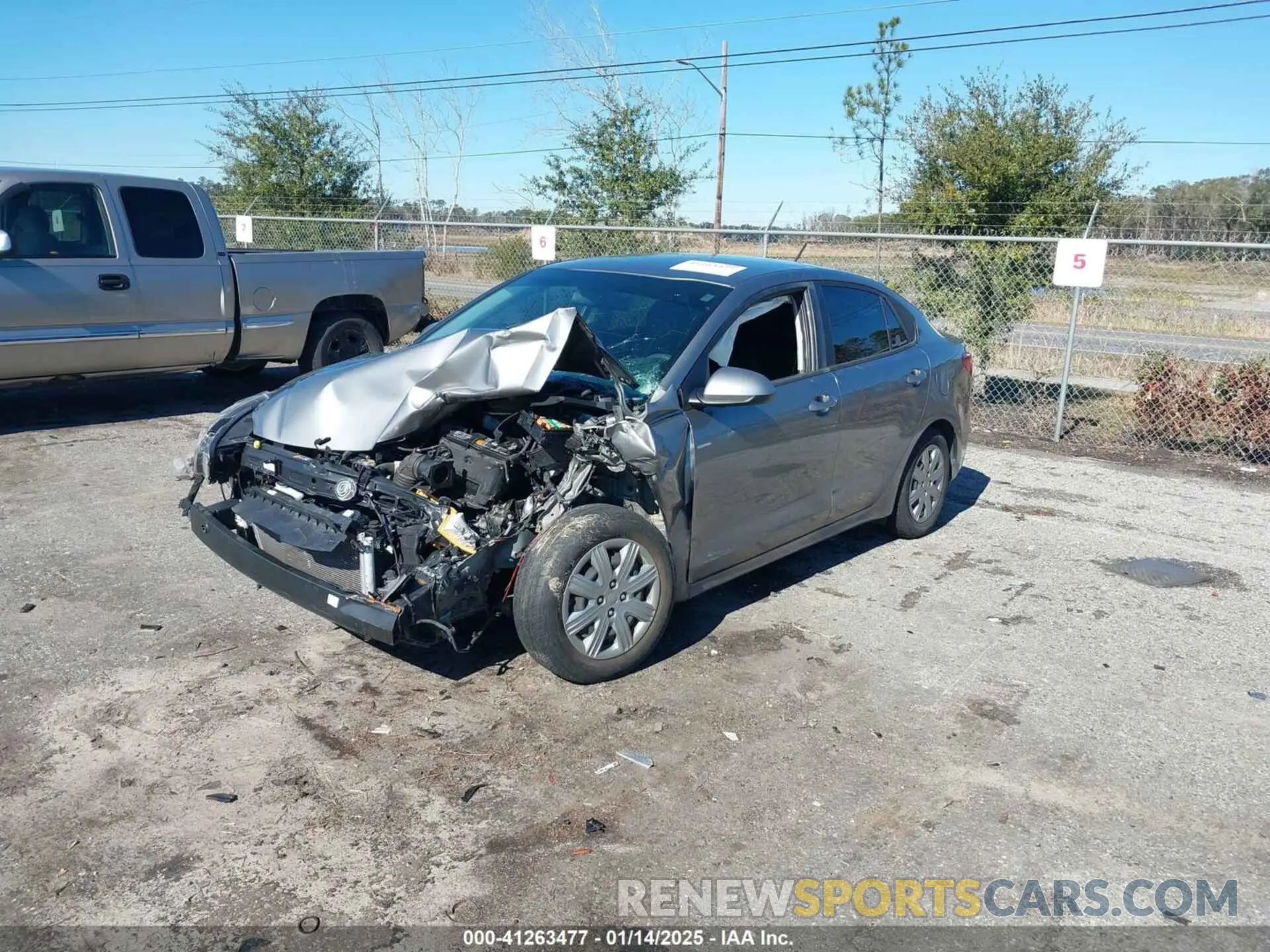 2 fotografías del automóvil dañado 3KPA24AD9NE464104 KIA RIO 2022