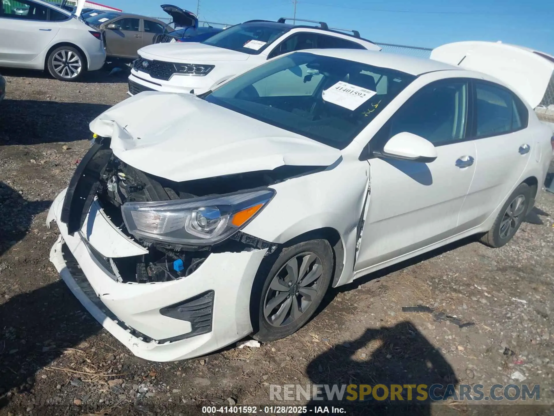 2 fotografías del automóvil dañado 3KPA24AD0PE520787 KIA RIO 2023