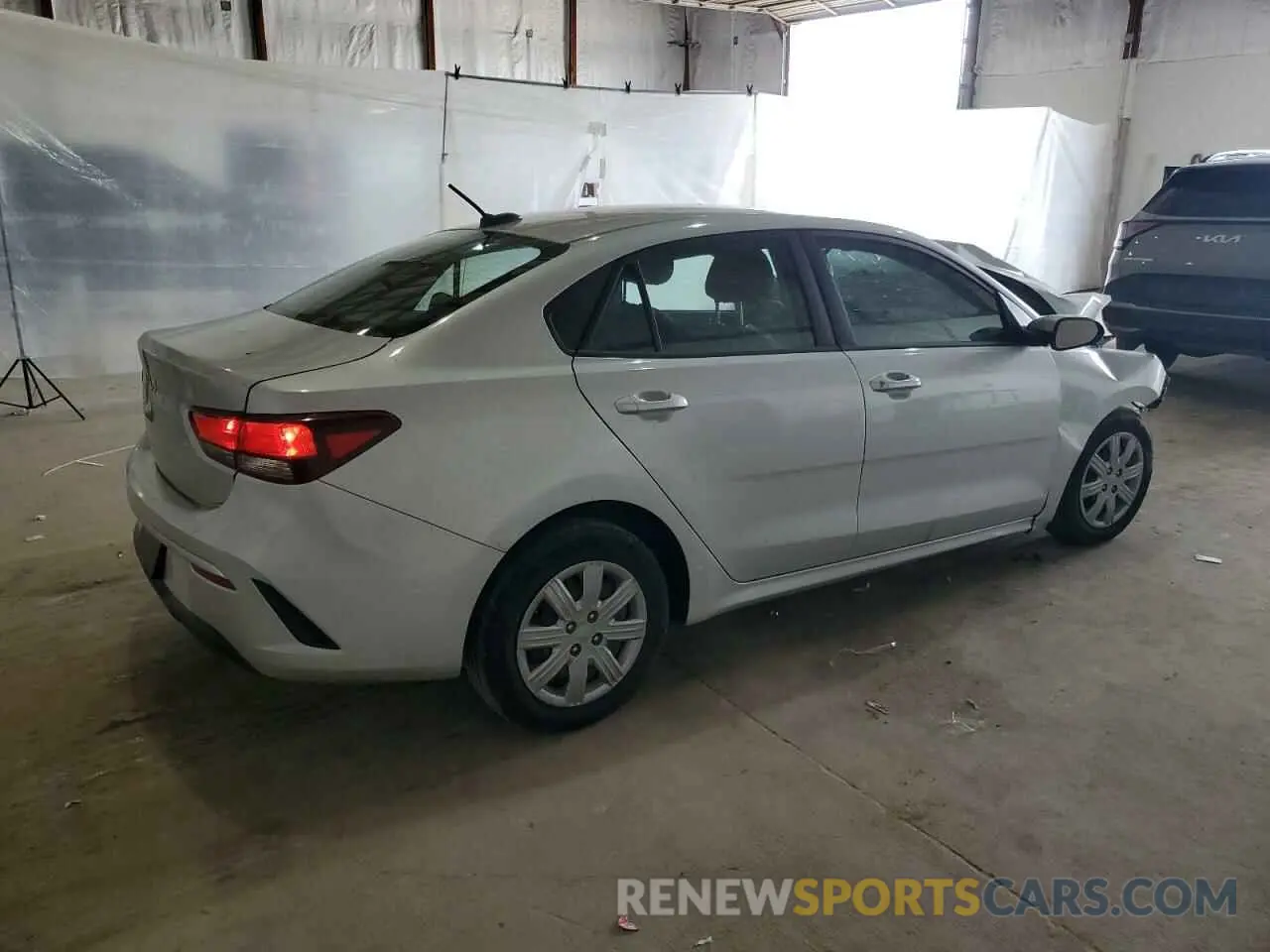3 fotografías del automóvil dañado 3KPA24AD1PE618985 KIA RIO 2023