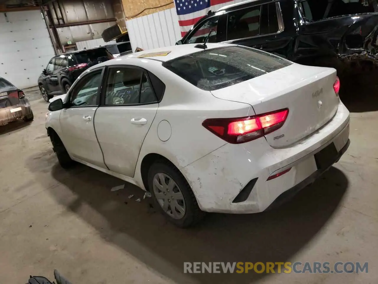 2 fotografías del automóvil dañado 3KPA24AD4PE524051 KIA RIO 2023