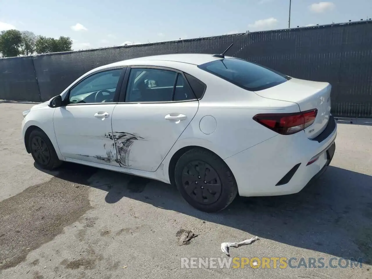2 fotografías del automóvil dañado 3KPA24AD4PE561052 KIA RIO 2023