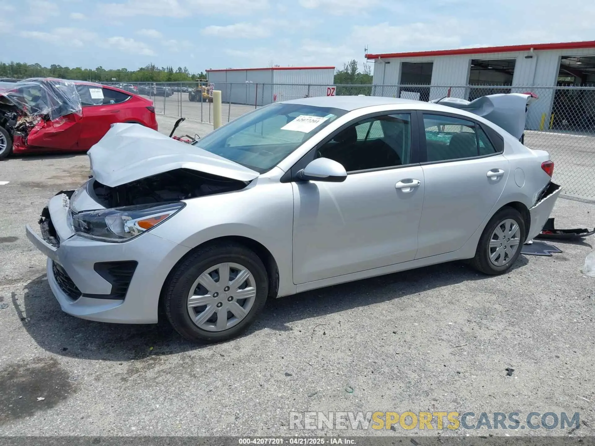 2 fotografías del automóvil dañado 3KPA24AD4PE604207 KIA RIO 2023
