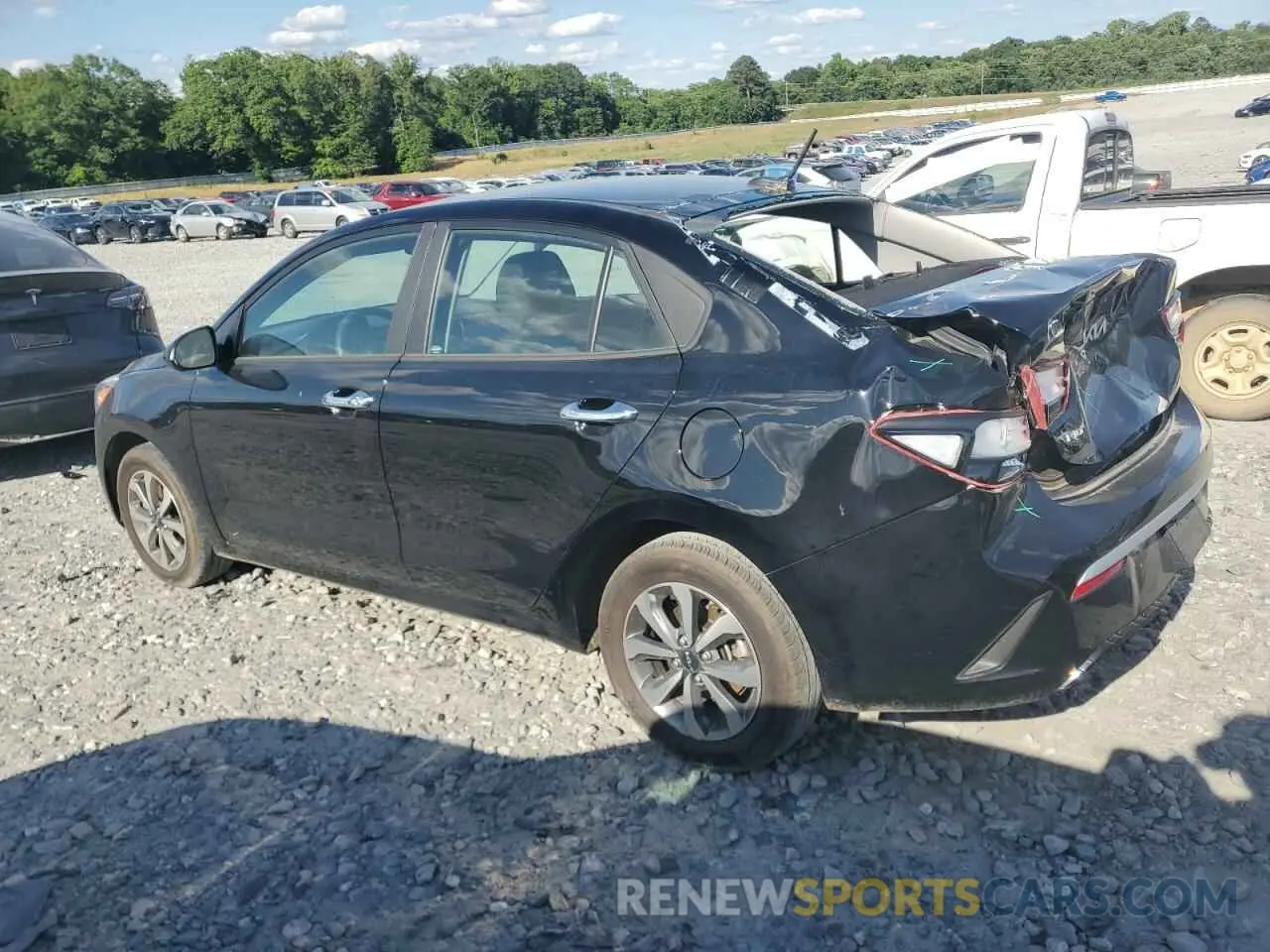 2 fotografías del automóvil dañado 3KPA24AD4PE613084 KIA RIO 2023