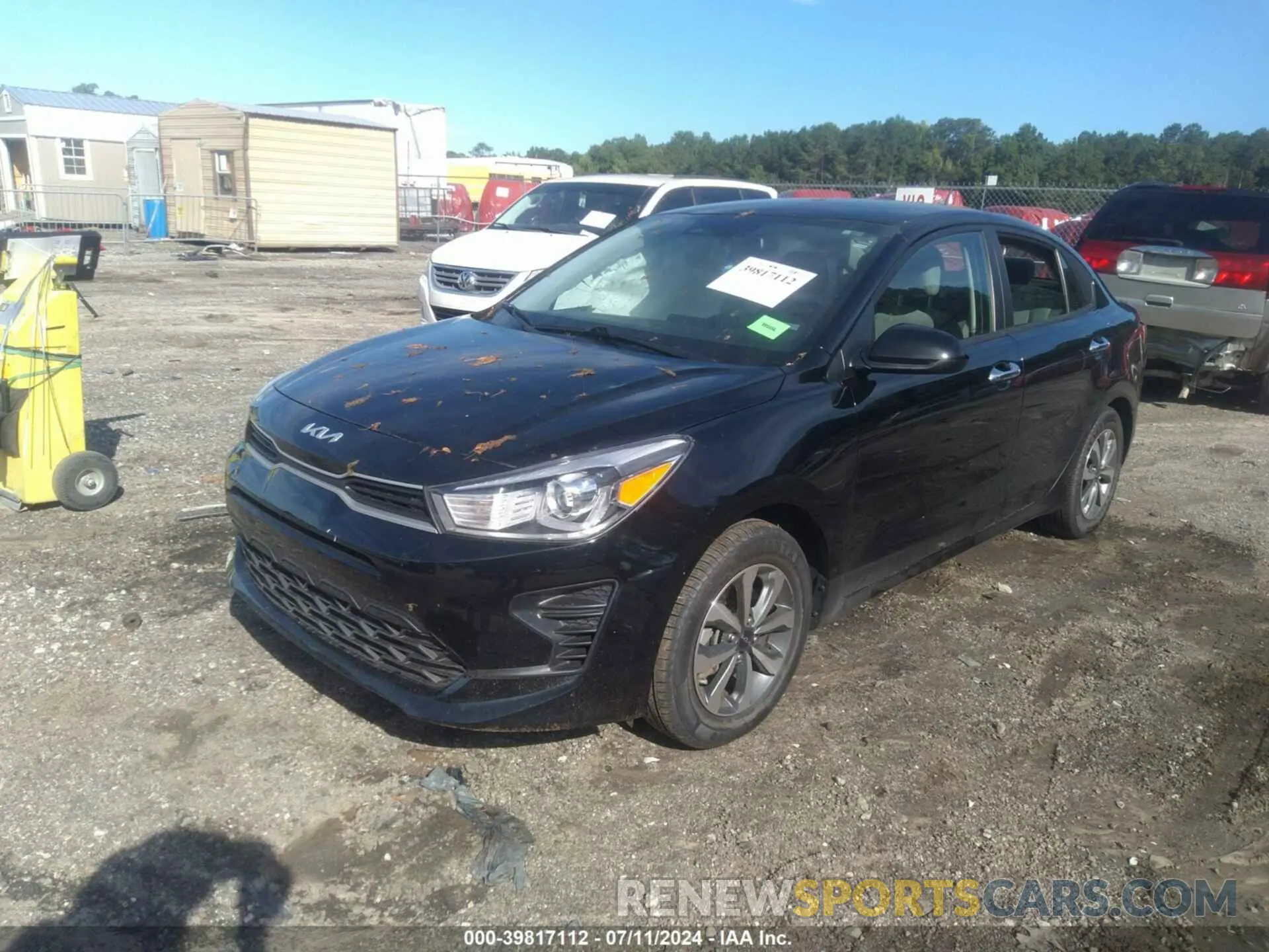 2 fotografías del automóvil dañado 3KPA24AD5PE531705 KIA RIO 2023