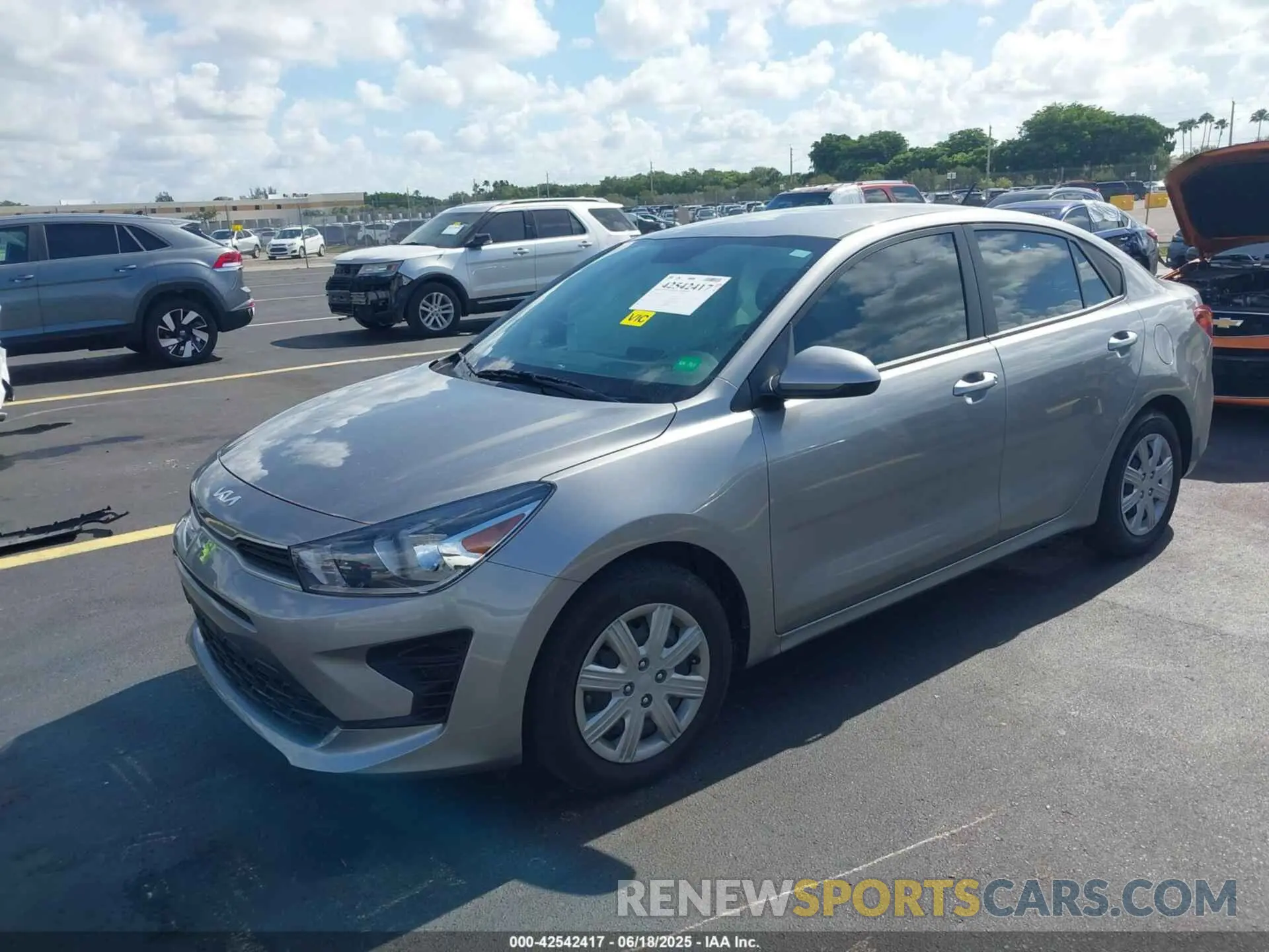 2 fotografías del automóvil dañado 3KPA24AD5PE565384 KIA RIO 2023