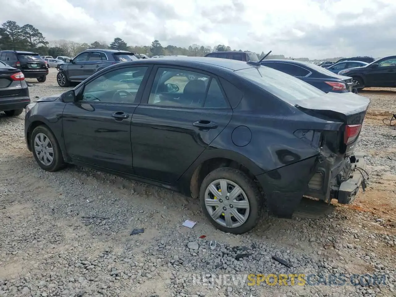 2 fotografías del automóvil dañado 3KPA24AD5PE583058 KIA RIO 2023