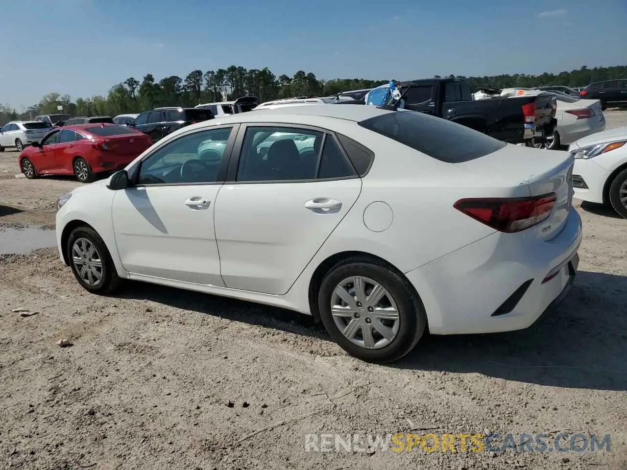 2 fotografías del automóvil dañado 3KPA24AD5PE626278 KIA RIO 2023