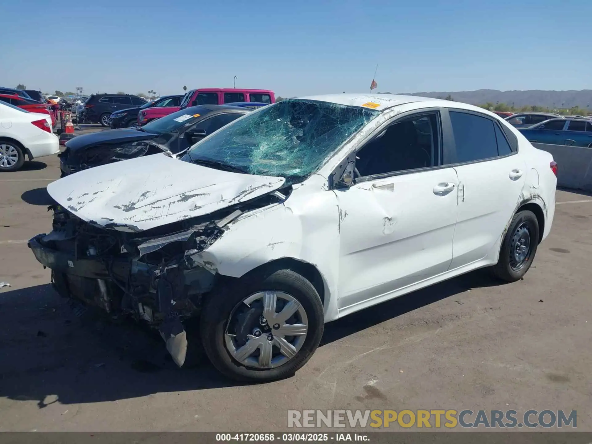 2 fotografías del automóvil dañado 3KPA24AD6PE599186 KIA RIO 2023