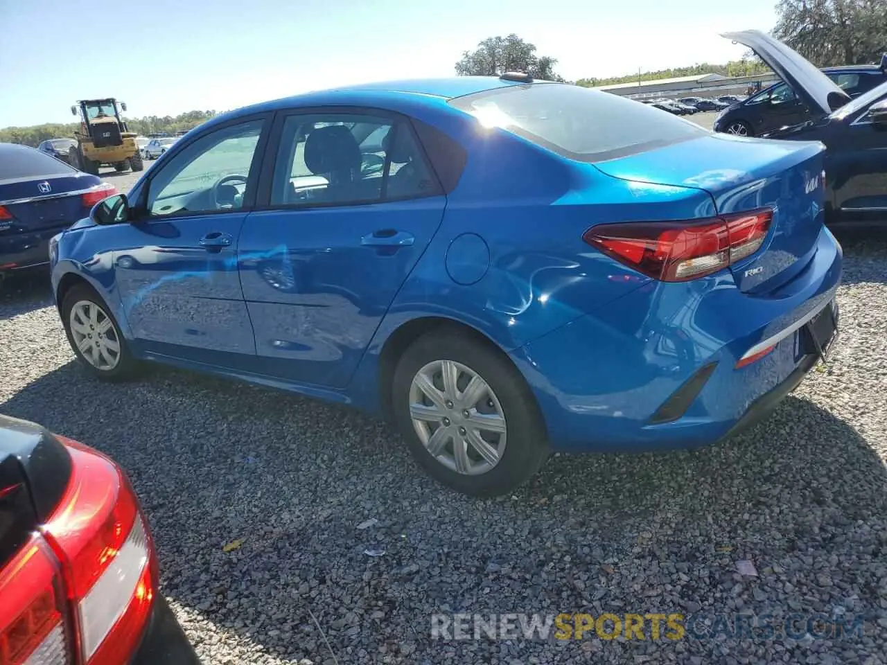 2 fotografías del automóvil dañado 3KPA24AD6PE619825 KIA RIO 2023