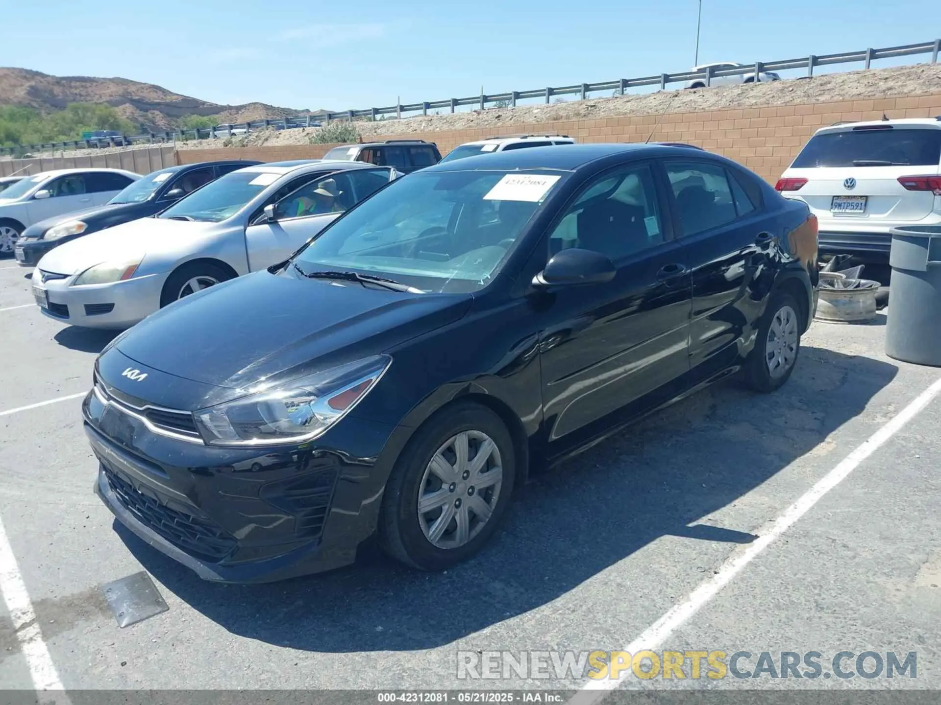 2 fotografías del automóvil dañado 3KPA24AD7PE615833 KIA RIO 2023