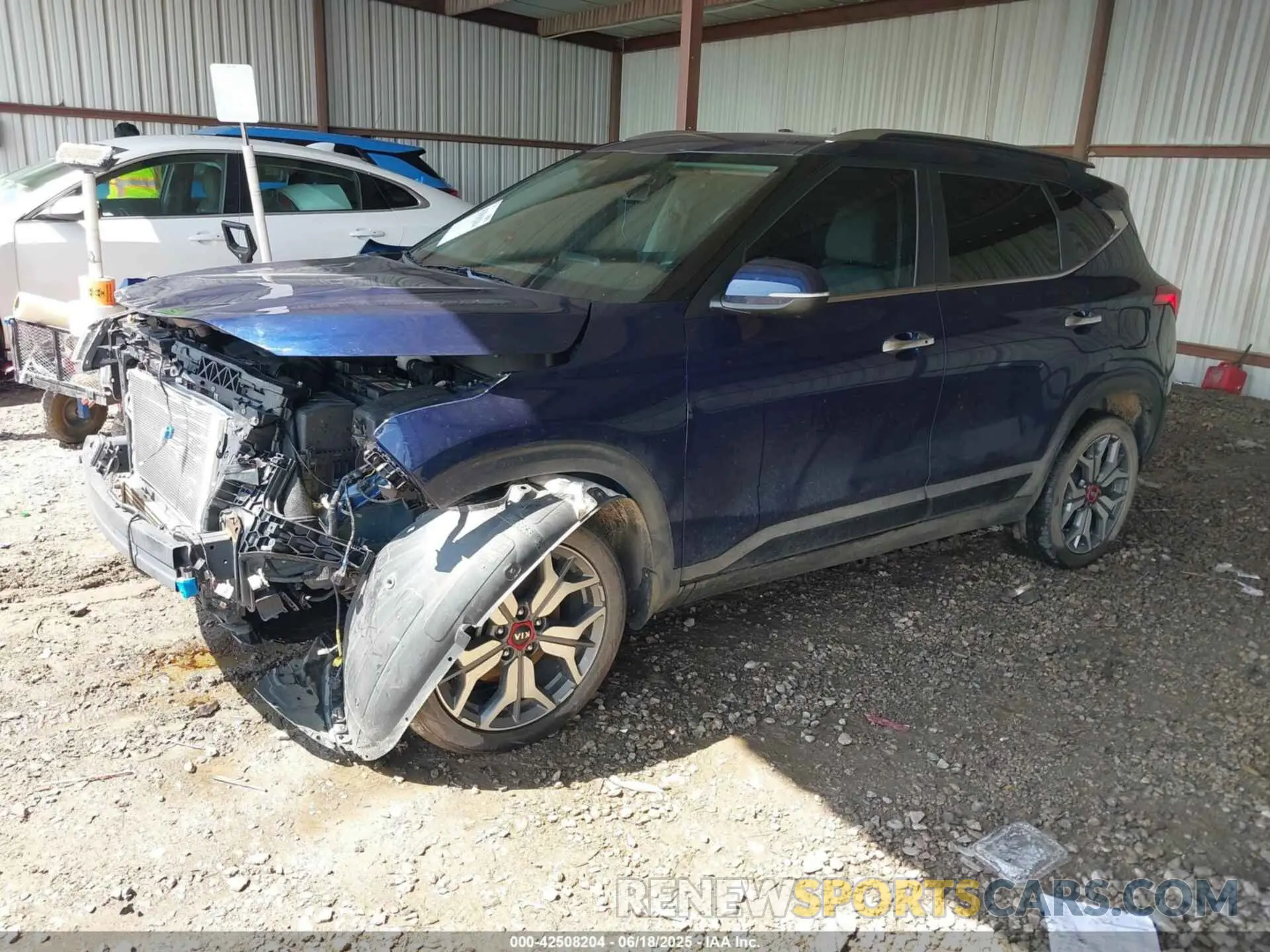 2 fotografías del automóvil dañado KNDETCA2XM7099129 KIA SELTOS 2021