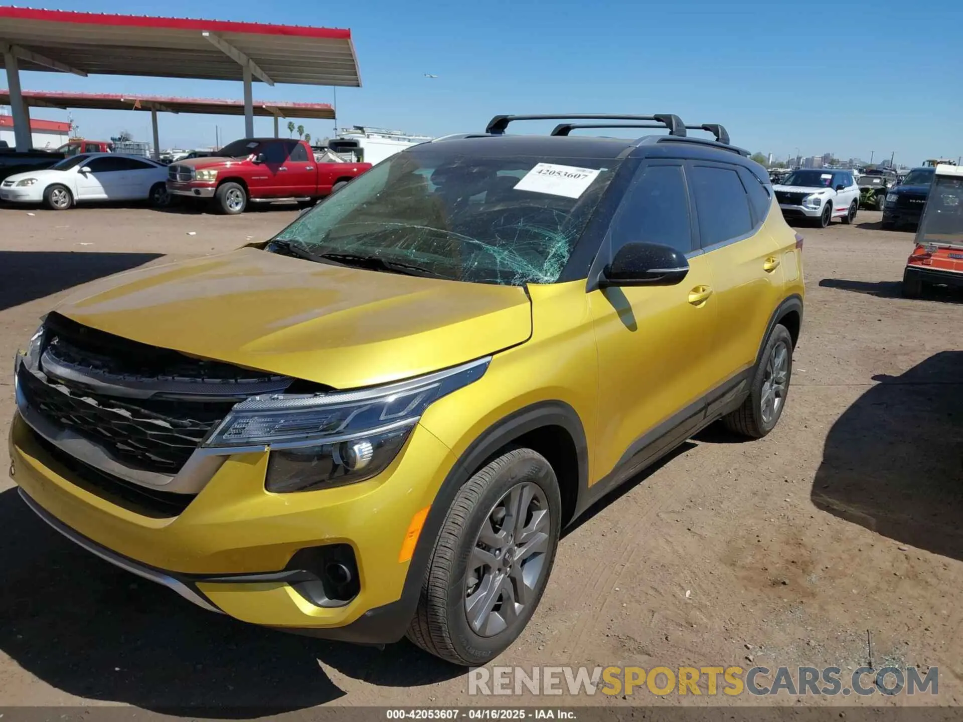 2 fotografías del automóvil dañado KNDEU2AA0M7125512 KIA SELTOS 2021