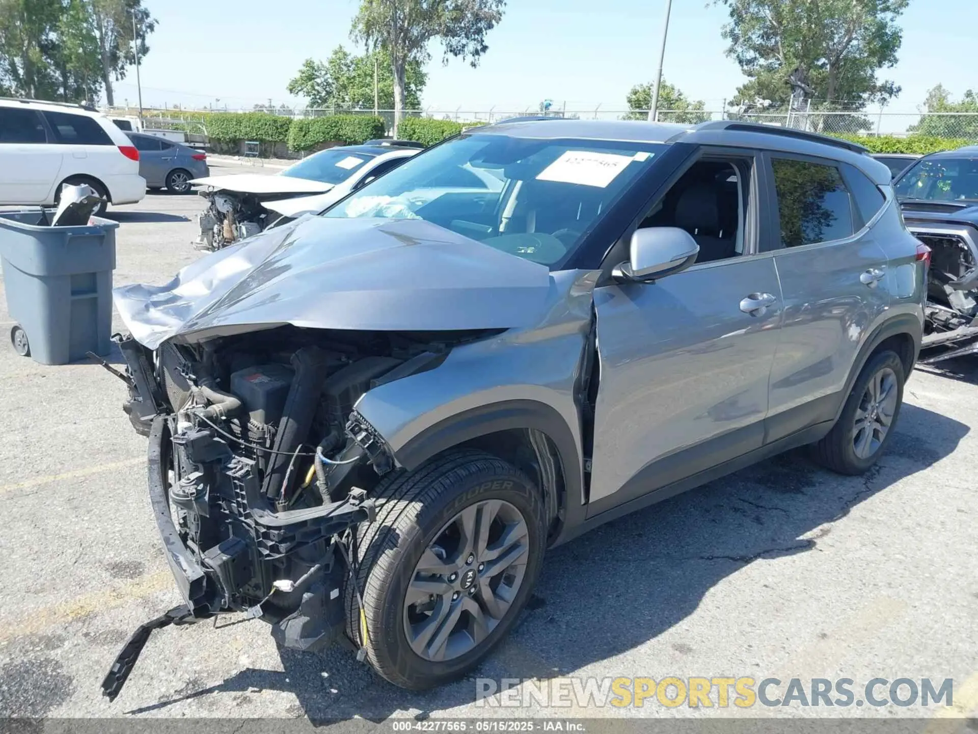 2 fotografías del automóvil dañado KNDEU2AA8M7225051 KIA SELTOS 2021
