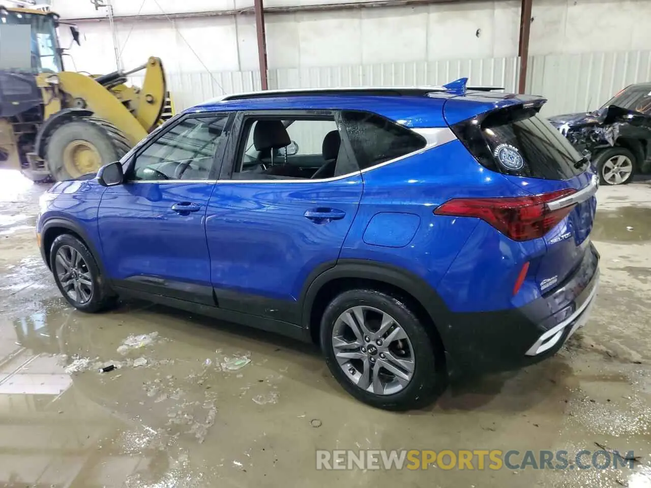 2 fotografías del automóvil dañado KNDEU2AAXM7106160 KIA SELTOS 2021