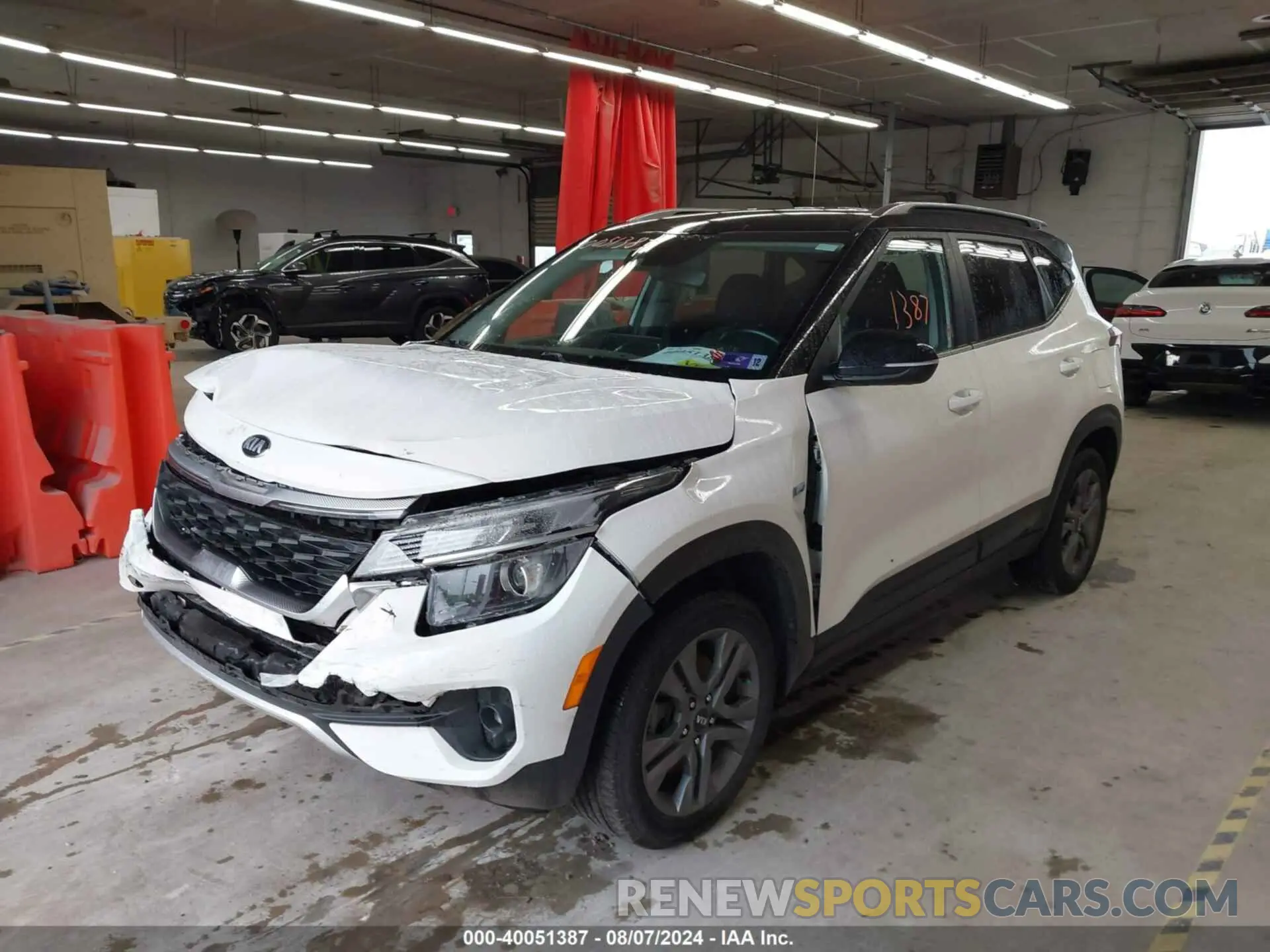 2 fotografías del automóvil dañado KNDEUCAA5M7052787 KIA SELTOS 2021