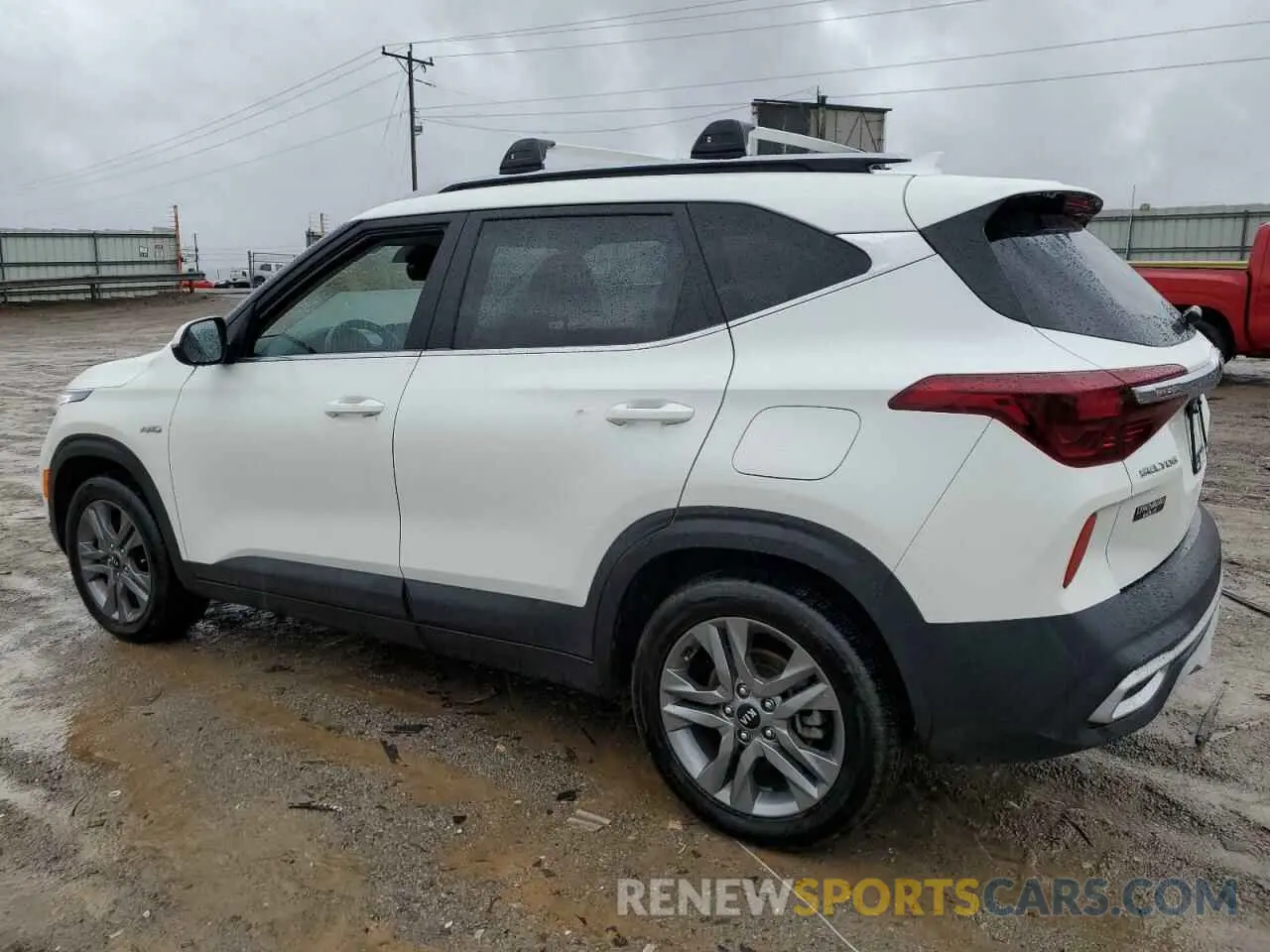 2 fotografías del automóvil dañado KNDEUCAA7M7171876 KIA SELTOS 2021