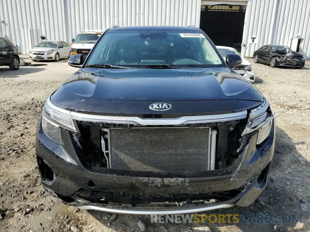 5 fotografías del automóvil dañado KNDEUCAA8M7101609 KIA SELTOS 2021