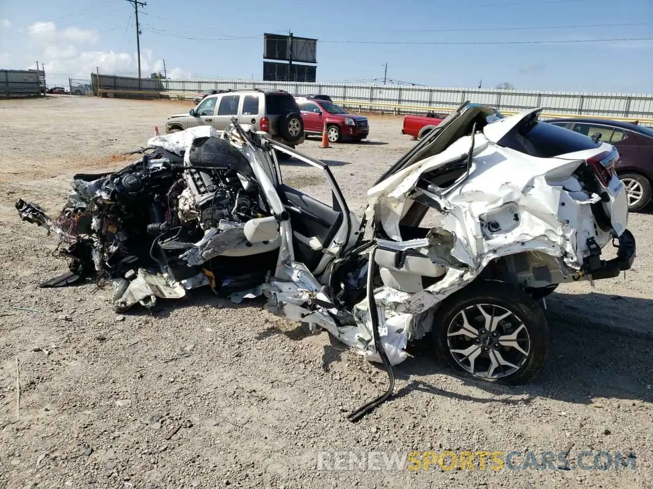 2 fotografías del automóvil dañado KNDERCAA0N7313584 KIA SELTOS 2022