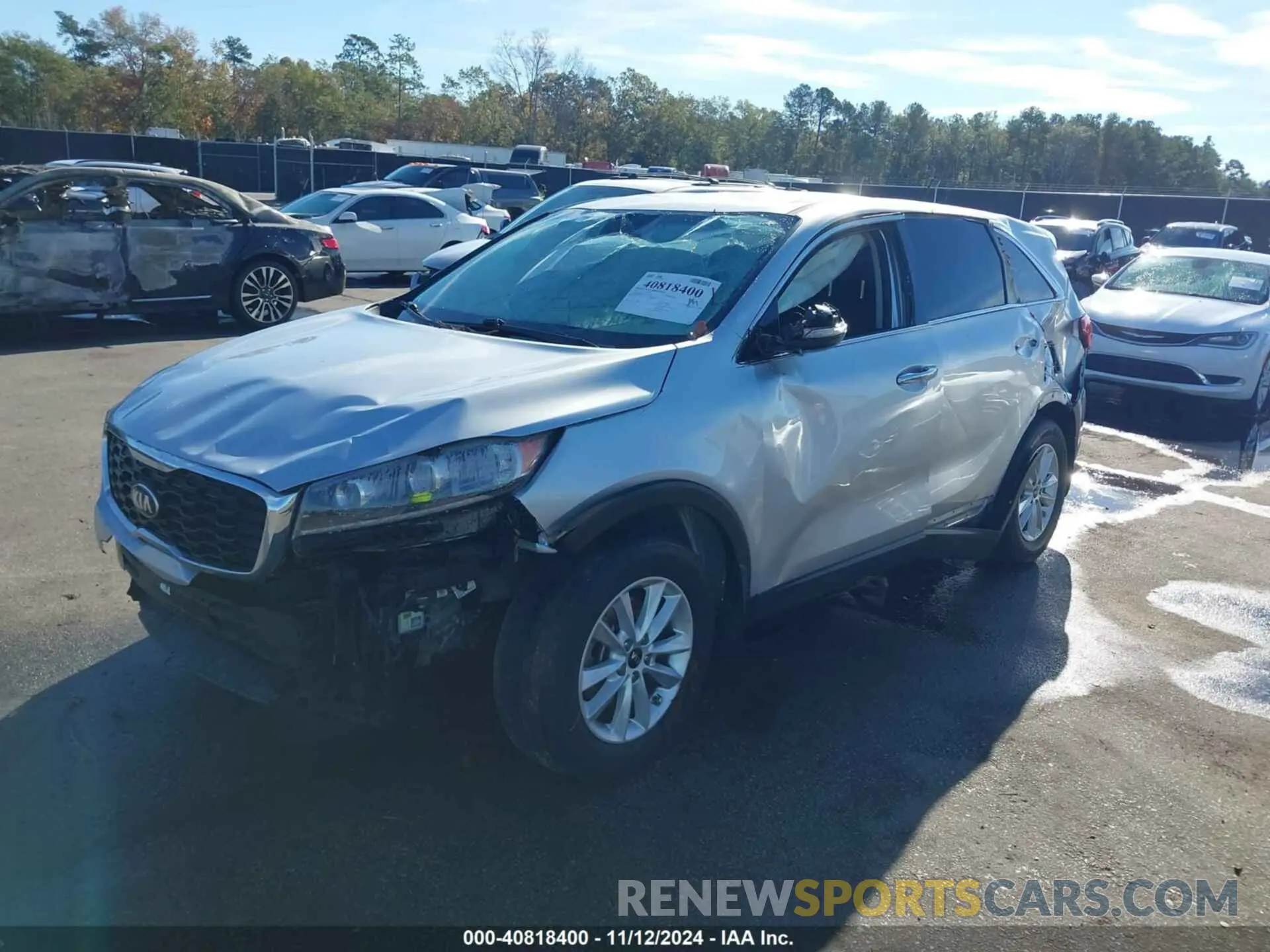 2 fotografías del automóvil dañado 5XYPG4A32KG583159 KIA SORENTO 2019