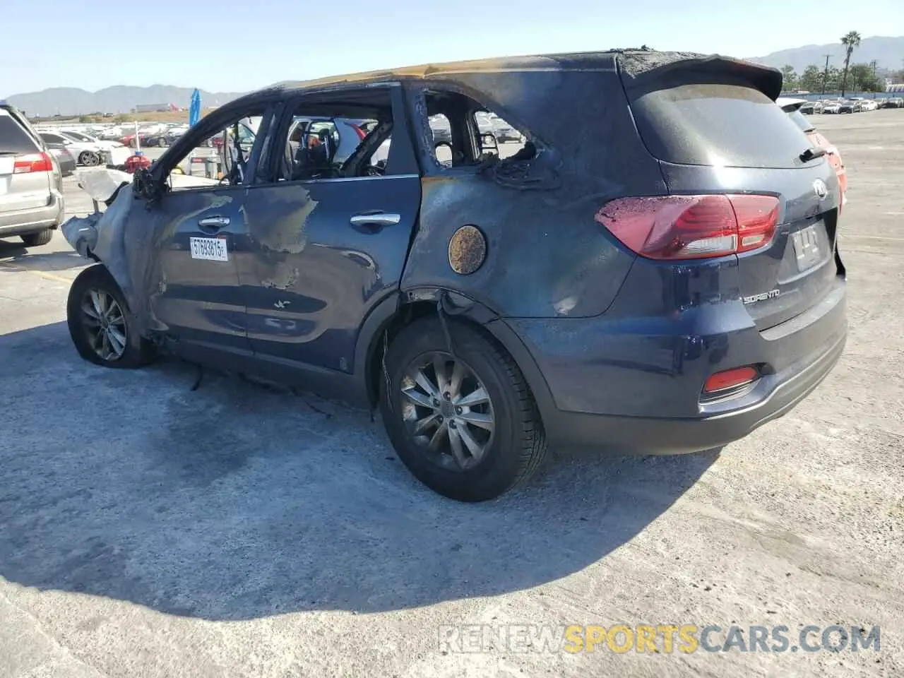 2 fotografías del automóvil dañado 5XYPG4A5XKG490455 KIA SORENTO 2019