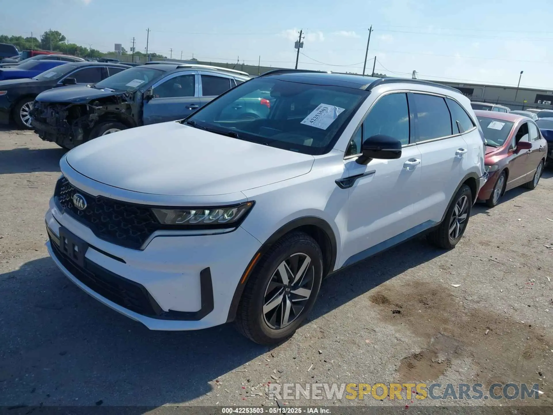 2 fotografías del automóvil dañado 5XYRL4LC1MG002786 KIA SORENTO 2021