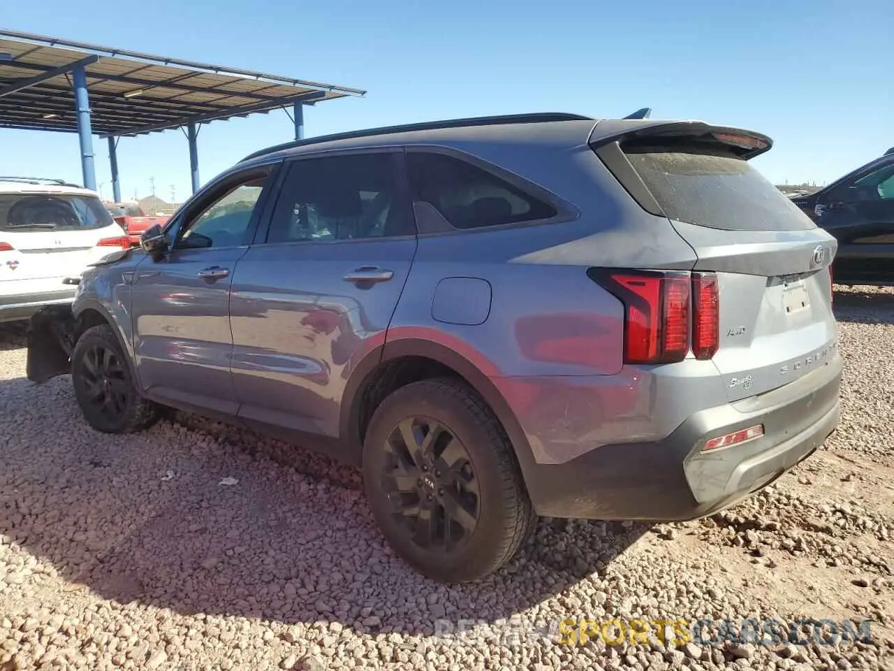 2 fotografías del automóvil dañado 5XYRLDLC6MG054348 KIA SORENTO 2021