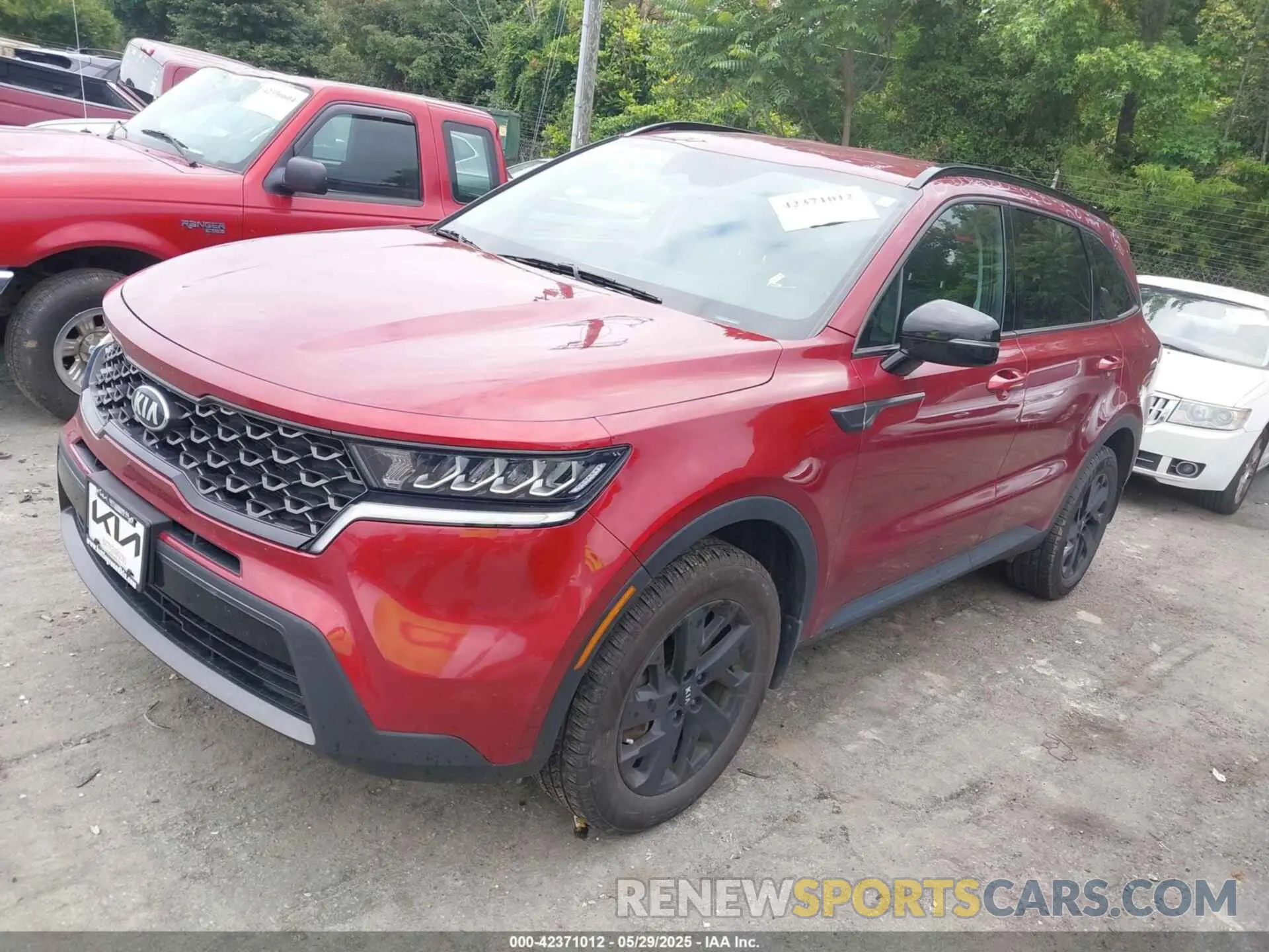 2 fotografías del automóvil dañado 5XYRLDLC7MG065018 KIA SORENTO 2021
