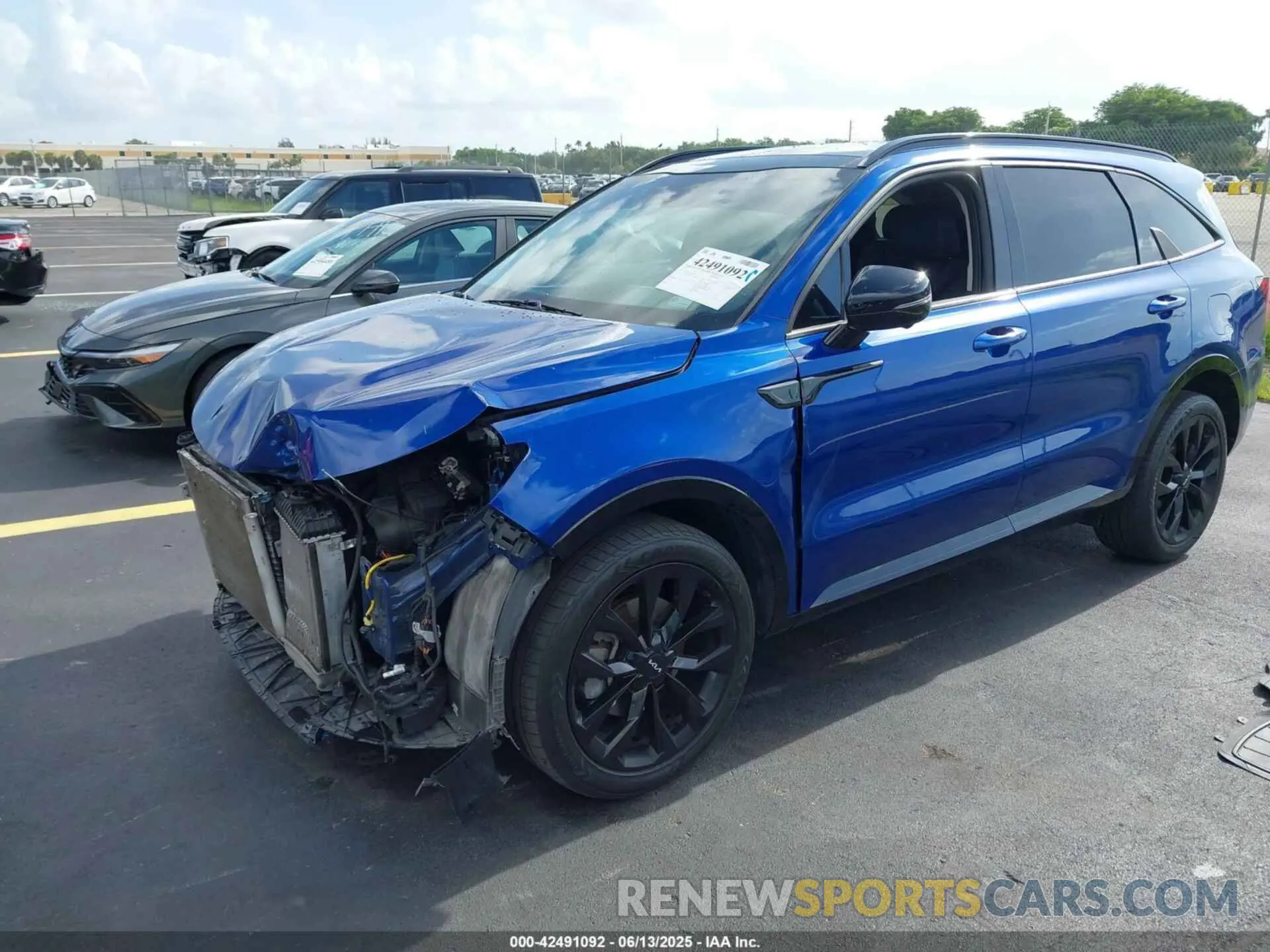 2 fotografías del automóvil dañado 5XYRK4LF8NG089617 KIA SORENTO 2022