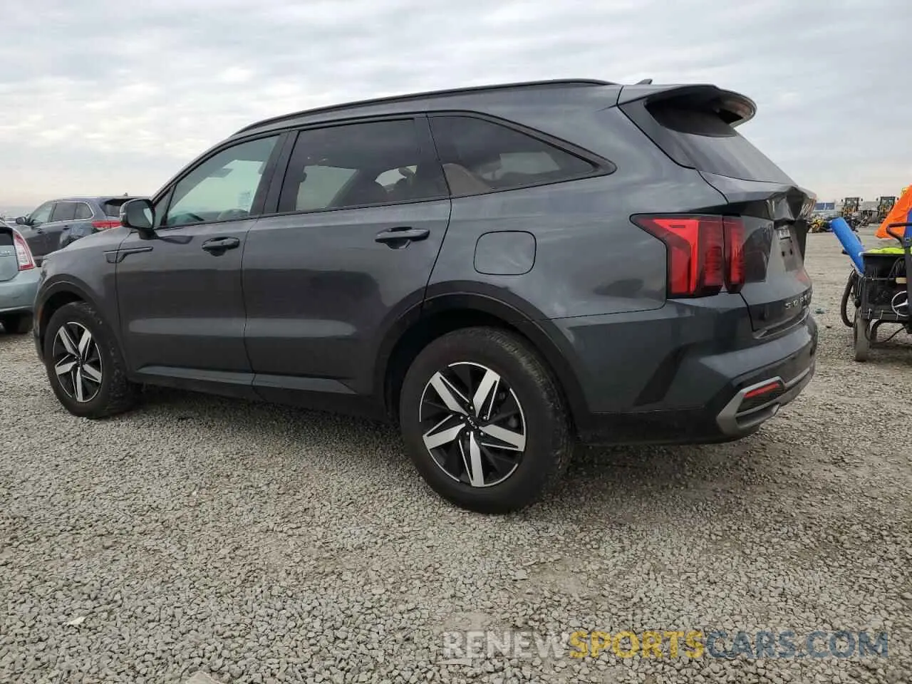 2 fotografías del automóvil dañado 5XYRL4LC3NG084988 KIA SORENTO 2022