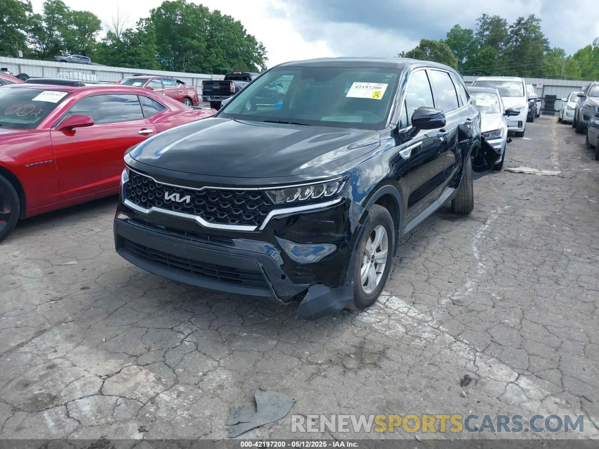 2 fotografías del automóvil dañado 5XYRG4LC1PG226455 KIA SORENTO 2023