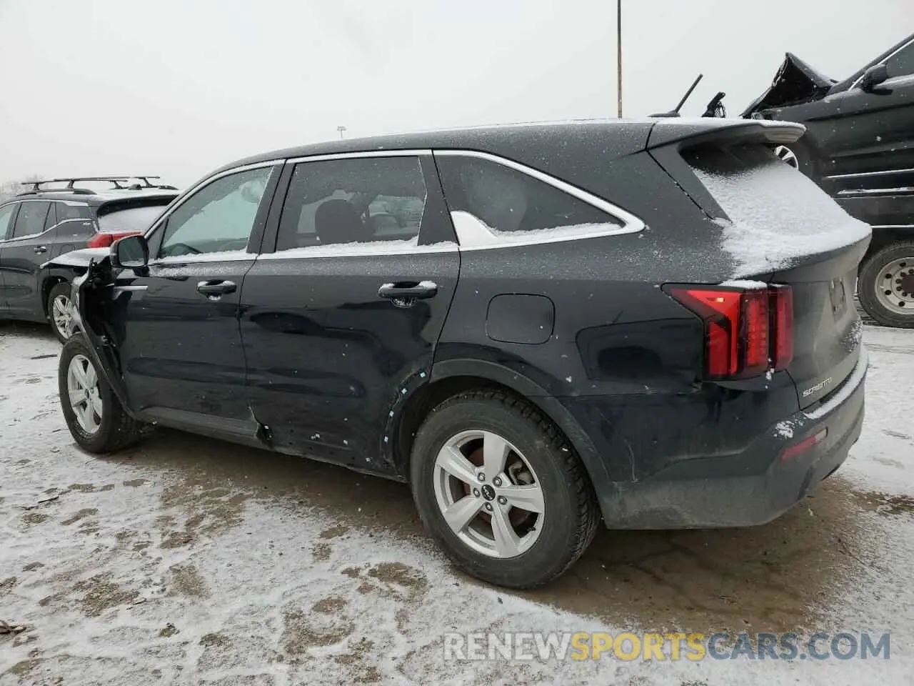 2 fotografías del automóvil dañado 5XYRG4LC8PG219826 KIA SORENTO 2023